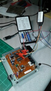 IF-232C on the bench, connected to a computer-based logic analyzer and an RS232 breakout box for logic and signal analysis.